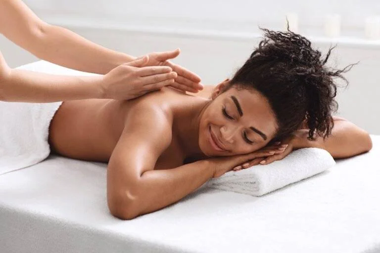 a young lady get a relaxing massage