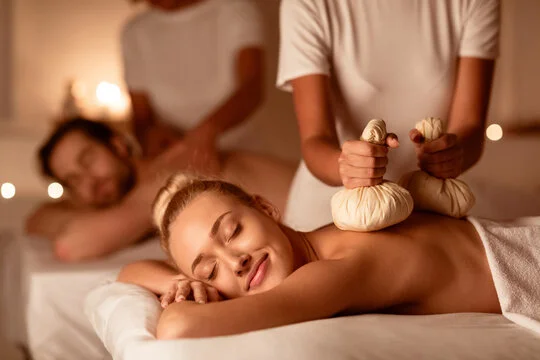 A couples are getting a relaxing Couples massage in Wake Forest