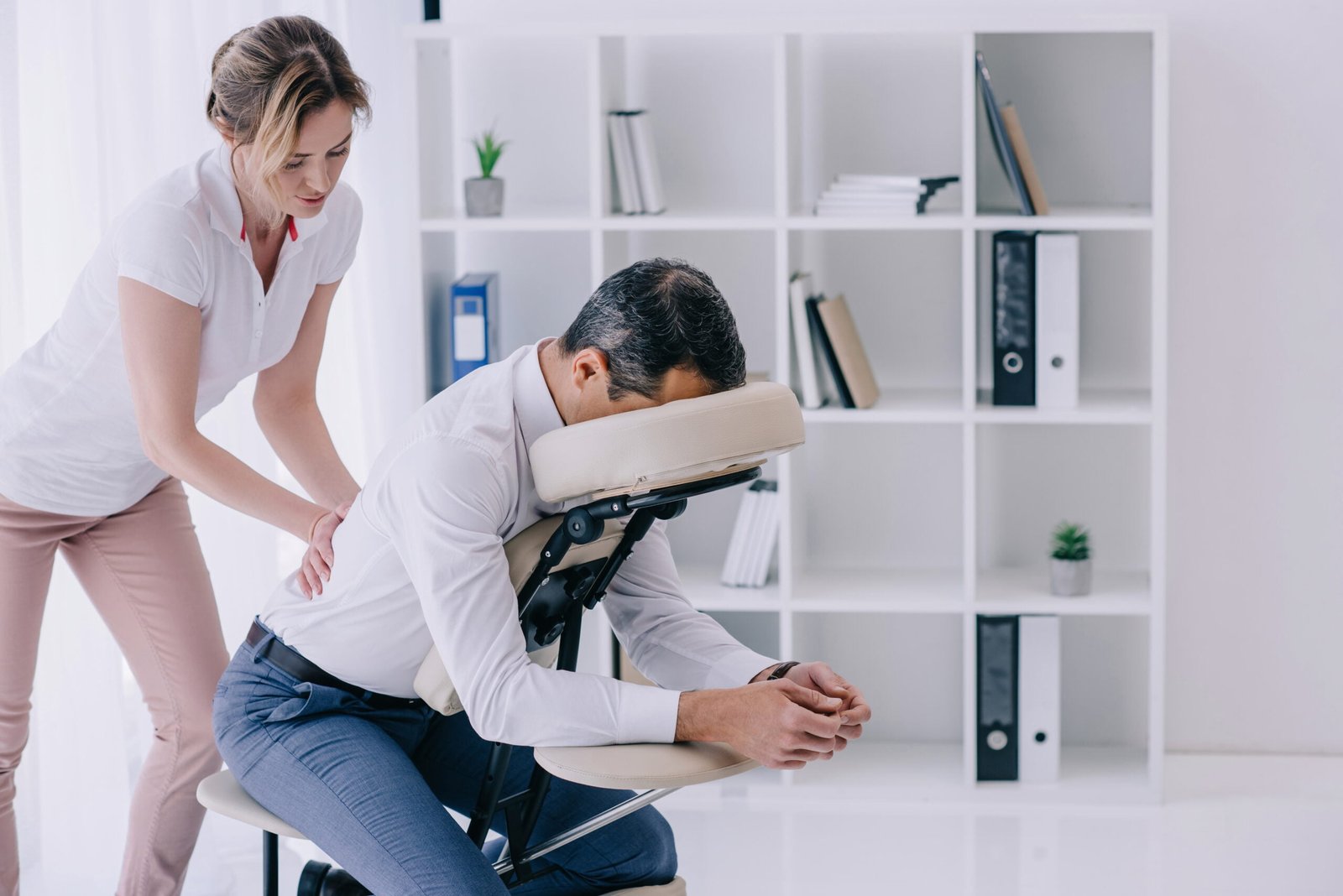 A Man getting chair massage