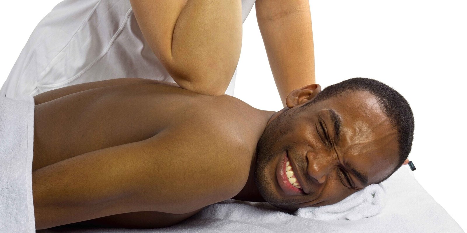 A stressed man is getting deep tissue massage