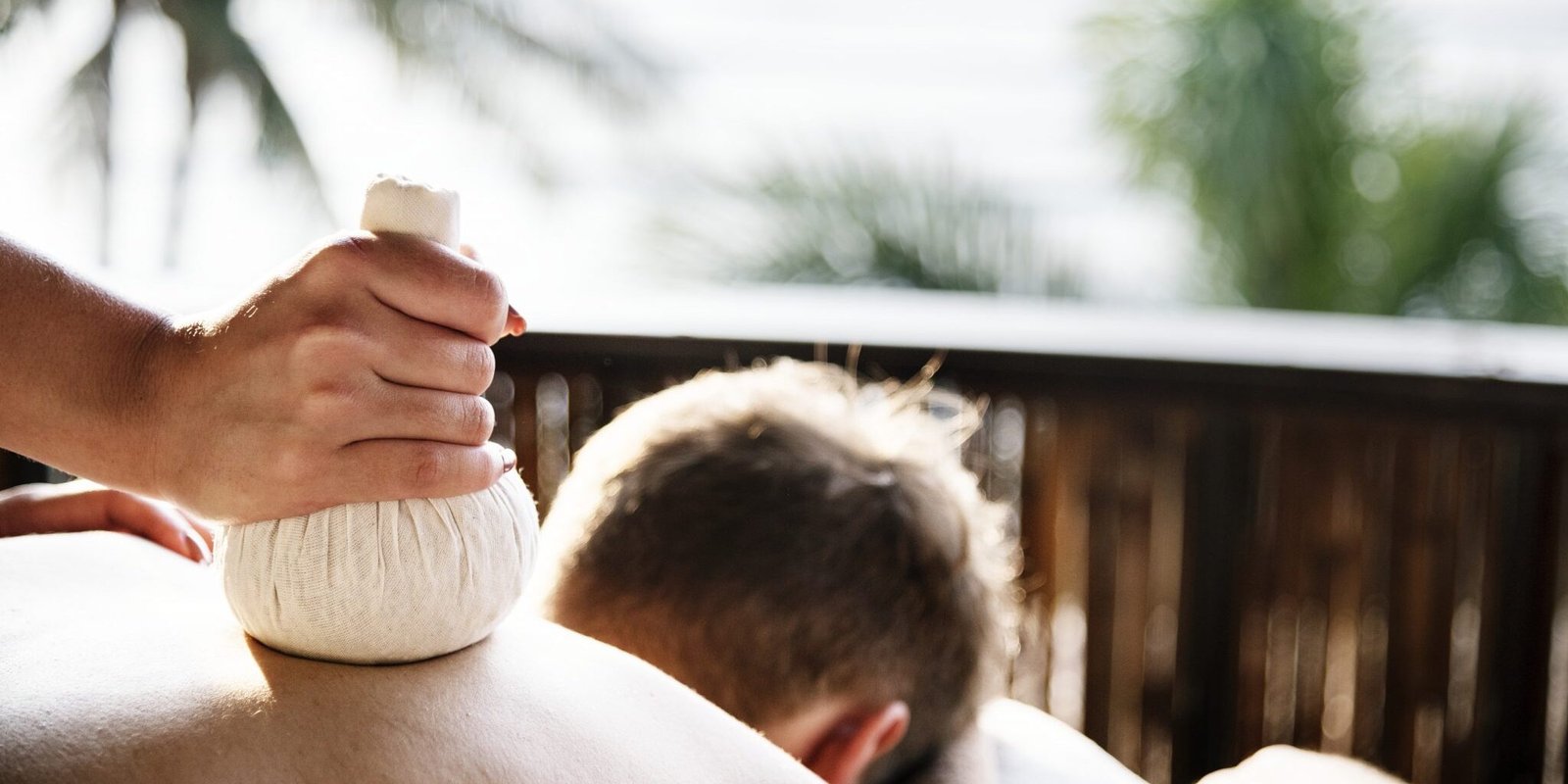 man having Thai Herbal Compress Massage man having Thai Herbal Compress Massage
